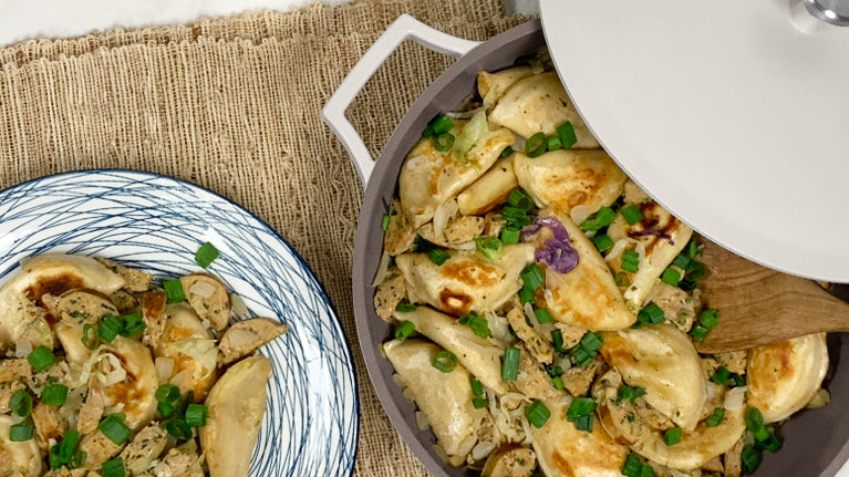 Sausage & Pierogi Skillet in The Pan with The Spoon