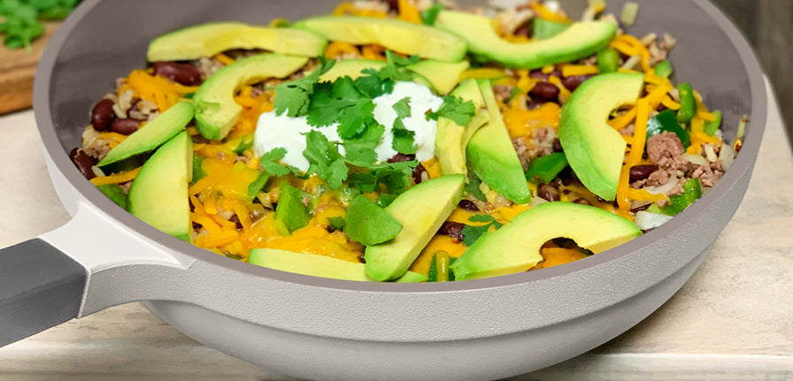 Beef Burrito Bowl Recipe in The Pan in Gray topped with Avocados and cilantro