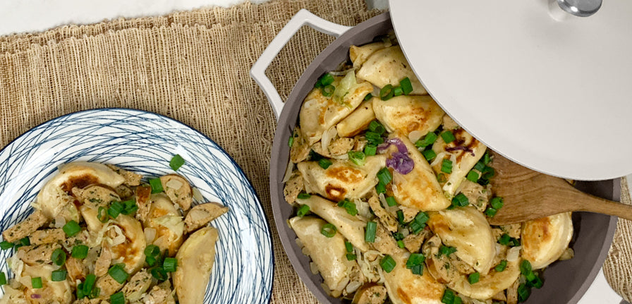 Sausage & Pierogi Skillet in The Pan with The Spoon