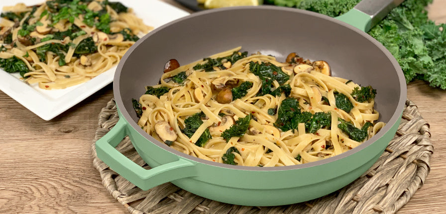 Spicy Garlic Mushroom Fettuccine inside The pan topped off with Cheddar